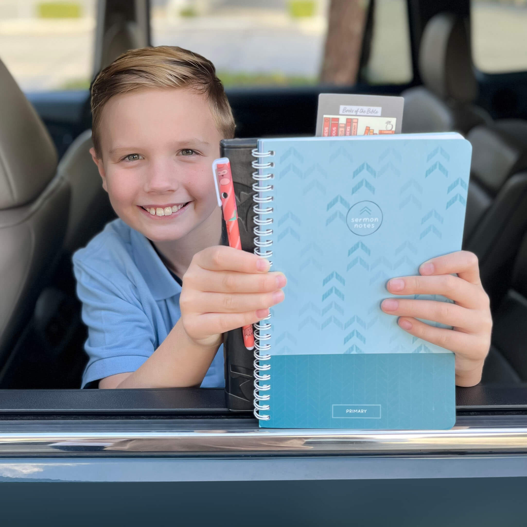 Boy with Sermon Notebook