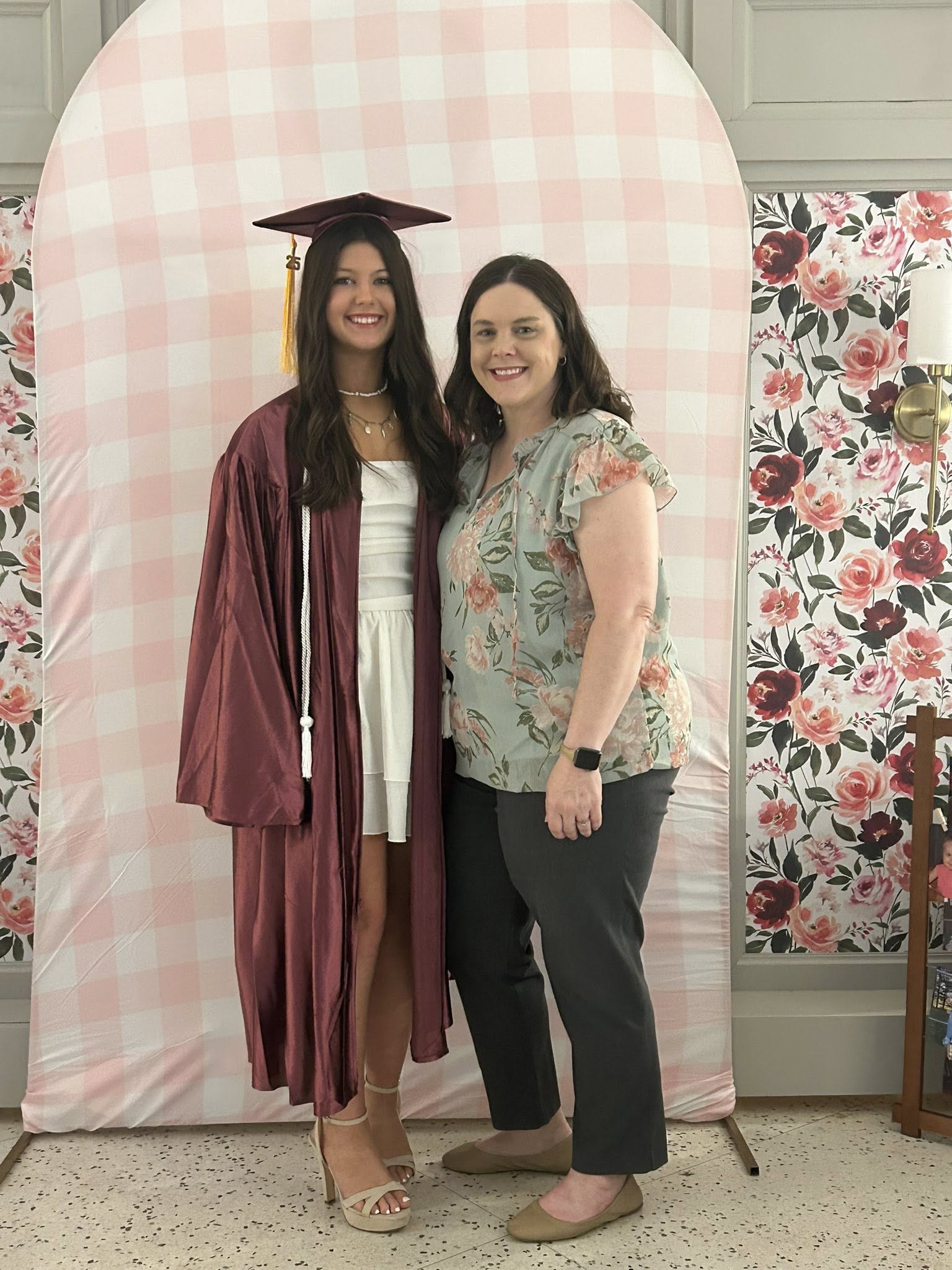 Parent and child at a homeschool graduation.
